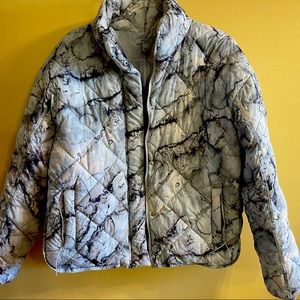 Super comfy jacket. Feels like a Goose comforter on. Super soft. Worn 2xs, FLEX